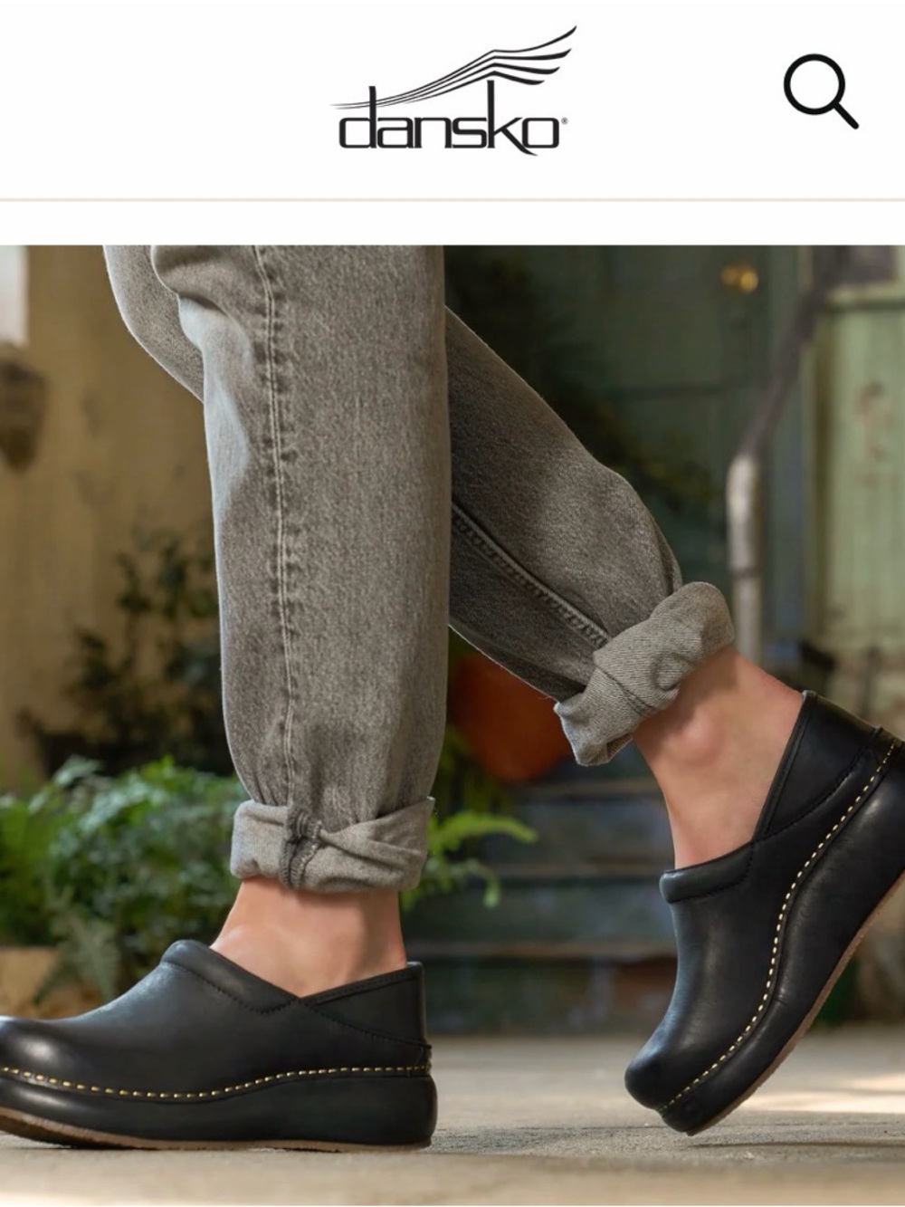 Dansko Black Leather Slip-On Clog with Contrast Stitching